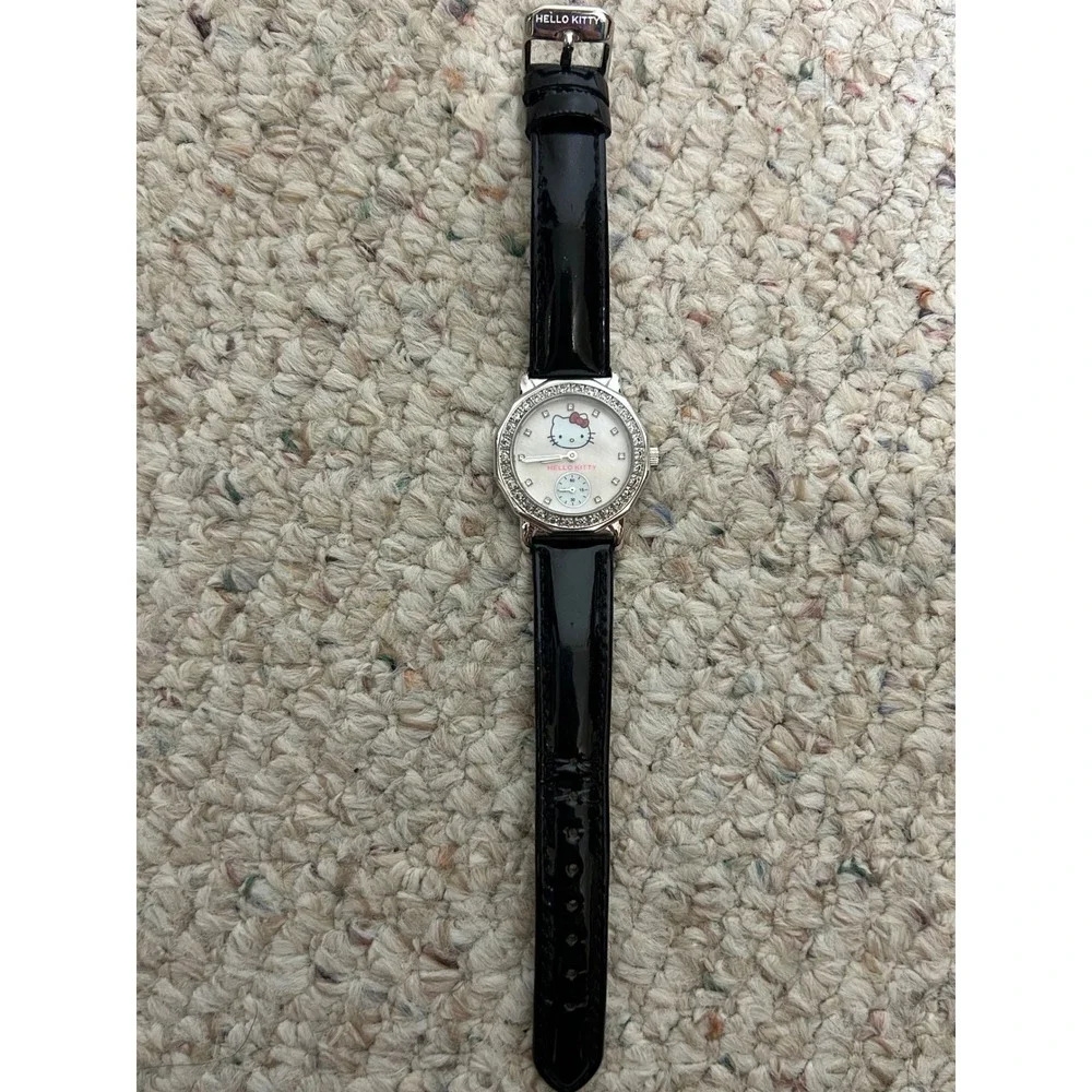 Hello Kitty Women's Watch Silver Tone Rhinestone Bezel Black Band